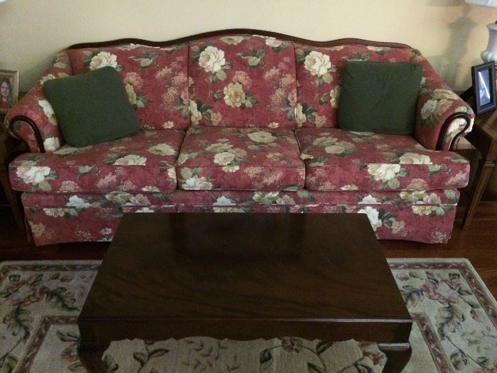 Floral sofa with wood accent, Broyhill, new condition