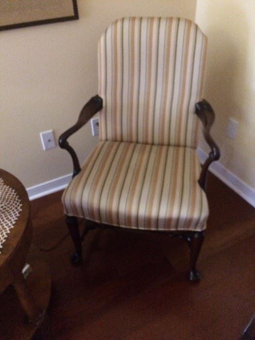 One of Two open arm chairs
