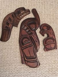 Carved wall figures by Jackson Robertson