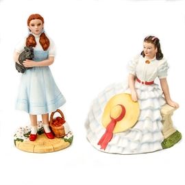 Avon Images of Hollywood Scarlett O'Hara and Dorothy Figurines: A pair of Avon “Images of Hollywood” Scarlett O'Hara and Dorothy Figurines. The Figurines are marked with “Avon Images of Hollywood” on the bottom. The marking also includes “Judy Garland as Dorothy in The Wizard of Oz” and “Vivien Leigh as Scarlett O’Hara in Gone with the Wind”.