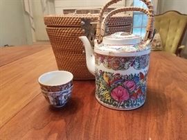 rose medallion teapot, cups in a basket
