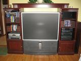 Akia largescreen tv (4 years old); Entertainment center; Sony component stereo system with speakers; Emerson DVD-R & VCR