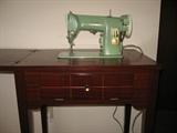 Singer 185K 1950's heavy duty sewing machine in mahogany cabinet with bench, w/manual and accessories, near perfect condition
