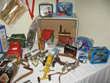 Vintage toys from 1900-1950's including iron toys, cap guns, metal trucks and lunch boxes