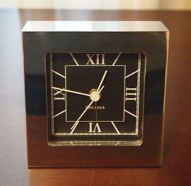 Lot 97: A Chelsea silverplate desk clock. Square shape, with alarm. Running when catalogued. Good condition. 3 3/8" wide. ESTIMATE $40-60