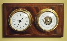 Lot 74: A contemporary English inlaid satinwood clock/barometer by Comitti. Brass, with enameled dials. Good condition. 9 x 5 1/4" high. ESTIMATE $100-200