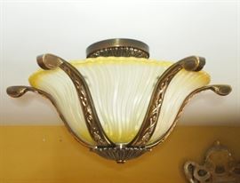 Lot 55: A French style glass and patinated metal semi-flush ceiling fixture. Good condition. Approximately 32" diameter, 13" high. ESTIMATE $200-300