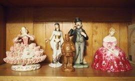 Lot 76: Five decorative porcelain and pottery figures. Including 1 Royal Doulton "Victoria"; 1 Saint Remy pottery figure of a soldier; and 3 other porcelain figures, one of which is Cleopatra. Possibly a minor chip or two to the ruffled skirt; overall, good condition. 5 1/4-8 1/2" high. ESTIMATE $100-200