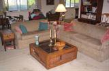 Newer sofa and love seat with nice vintage glass top coffee table