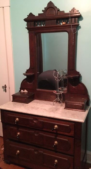 marble-topped dresser