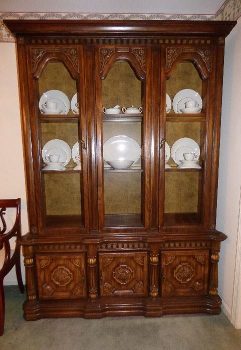 60's "Mediterranean" style china cabinet. This would be stunning painted white....
