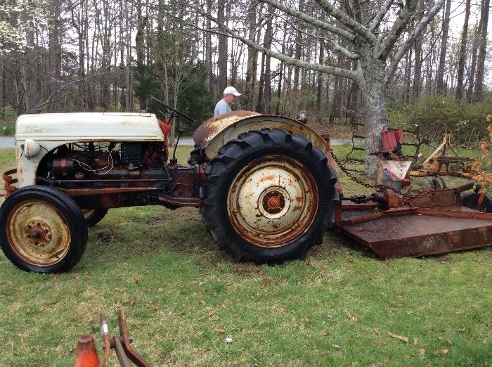Vintage 1950's Ford 8N tractor with bush hog. Runs good, new battery.  $2000 OBO