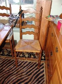 Set of 8 ladder back chairs matching hard rock maple table and sideboard