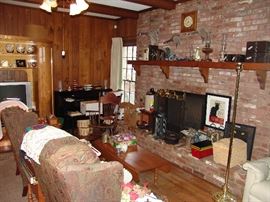 Den with piano and Deco piece