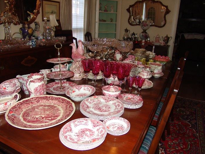 Dining room with red transfer ware and cranberry stems