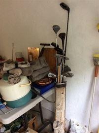 Old golf clubs in unusual skinny bag