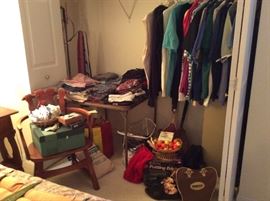Men's closet with bowling, golf, ice skates, clothing etc