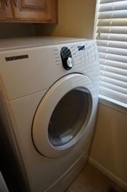 Samsung front loading washer and dryer (both with laundry pedestal under washer/dryer storage drawer)