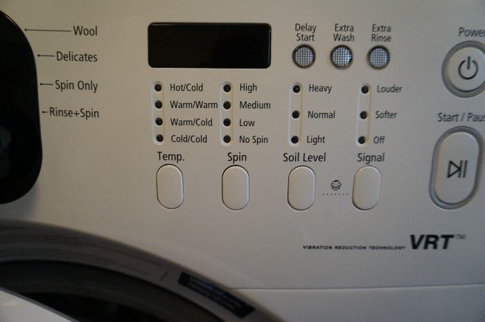 Samsung front loading washer and dryer (both with laundry pedestal under washer/dryer storage drawer)