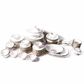 Schumann "Briar Rose" Dinner Service: An assortment of Schumann china dishes in the “Briar Rose” pattern. Included are twelve each of dinner plates, salad plates, bread plates, teacups and saucers, soup bowls, and and fruit saucers. Also included are a sauce boat with attached underplate, a covered vegetable dish, a sugar bowl, and a creamer. All are marked “Bavaria Schumann Arzberg Germany Briar Rose” to bottom.