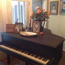 Dekalb 5 Foot Baby Grand Piano has Ivory Keys. Needs some restoration.