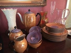 Teapot, sugar, cream, cups, saucers and small plates