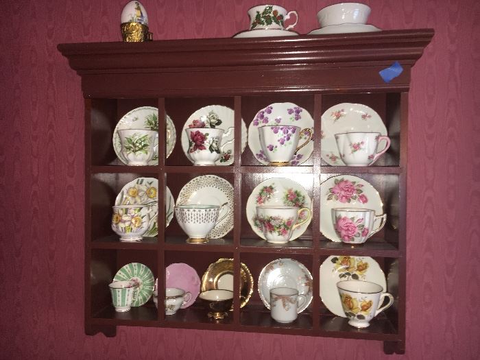 Shelf not for sale but all of the beautiful tea cups are!