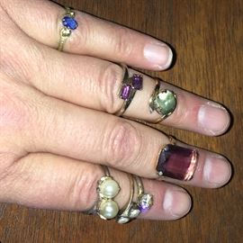 If you can see past my wrinkly fingers you will see lovely costume jewelry pieces...