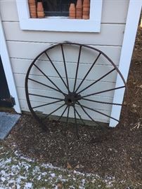 Outdoor decor, antique wheels