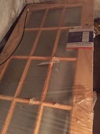 Brand new pine, windowed door.