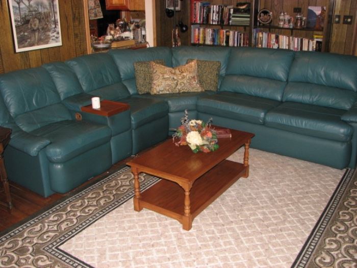 green leather sectional sofa, including reclining sections and sofabed