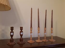 These candle holders and wood candles were made by their father.