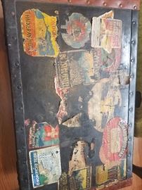 Vintage hand trunk, with travel stickers