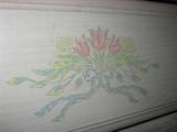 Close-up of Decal on Blonde Dressers