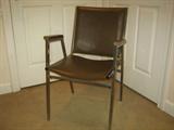 Brown leatherette and steel office arm chair