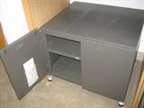 Steel storage cabinet...on casters, plenty of space to store papers, supplies, etc