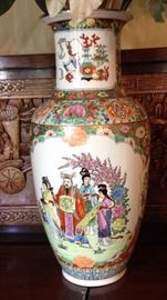 Large porcelain vase with Asian decor.
