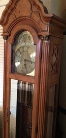 Chiming tall case clock.
