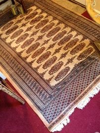 Hand knotted area rug. .