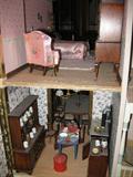 Handmade Victorian style dollhouse with handmade furniture