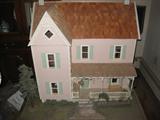 Handmade Victorian style dollhouse with handmade furniture