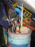 Assorted golf clubs