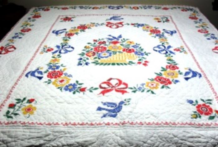 Hand quilted and hand counted cross stitched quilt