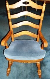 One of six Matching cushioned heavy chairs for dining room set--2 are captain's chairs, and 4 with no arms