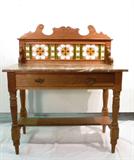 Marble top table with tiled back splash