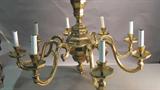 Lot 22 - 8 arm brass chandelier