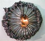 Mid C. wall sculpture