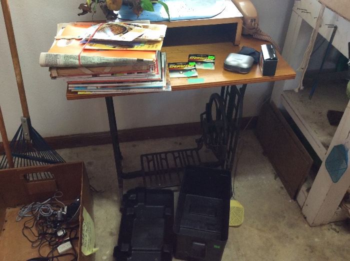 Garage storage room - table made from vintage treadle sewing machine 
