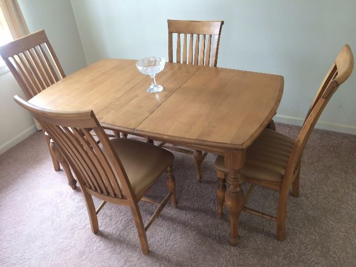 Dining room table, 1 leaf, 4 chairs. Made in Canada