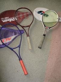 Tennis rackets each with cover